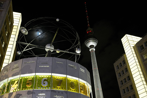 Berlin, Germany - April 5, 2017: World Time Clock Urania and TV Tower at Alexanderplatz in Berlin