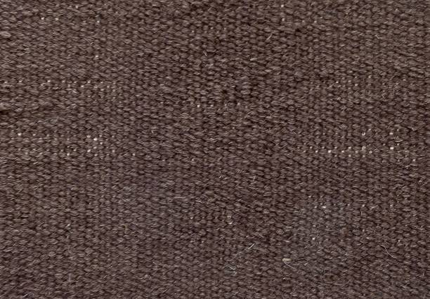 gros plan fond de texture en textile motif brun - close to brown wool canvas photos et images de collection