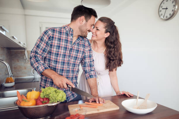 istock Happy young couple relaxing at home 910213874