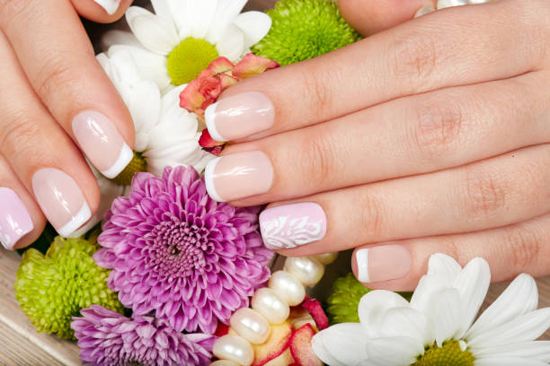 istock Hand with french manicured nails 910214474