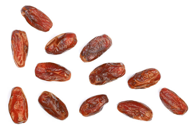 istock dry dates isolated on white background with copy space for your text. Top view. Flat lay pattern 910218106