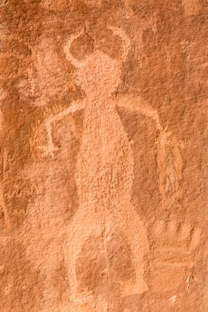 Pre-Columbian Anthropomorphic petrogyphs on the cliffs on the Escalante River Canyon in Grand Staircase Escalante National Monument, Utah.