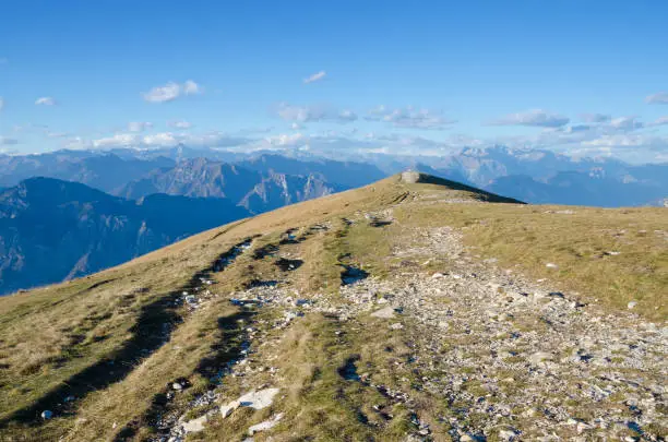 The mountain path leading from the top cable car station at Monte Baldo finishes at a vantage point that offers stunning views out across the northern end of Lake Garda.