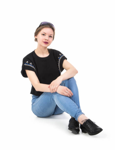 istock Young girl posing in jeans. 910226182