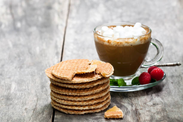 istock Stack  of Dutch caramel waffles with fresh raspberry and cup of coffee 910232236
