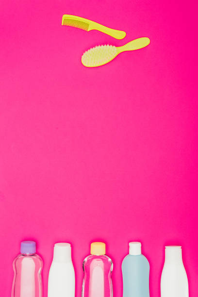 istock top view of combs and bathroom accessories isolated on pink 910235372
