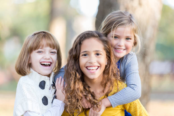 istock Portrait of beautiful sisters 910238520