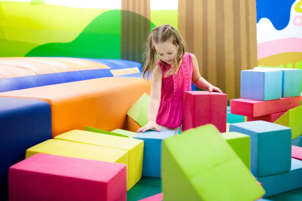 istock Kids play. Construction toy blocks. Child toys 910241044