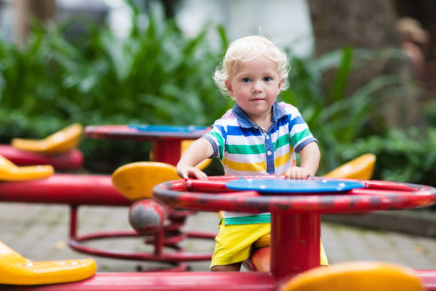 istock Child on school playground. Kids play. 910243962