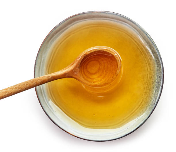 istock bowl of honey 910244772