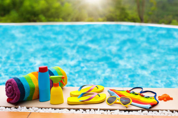 istock Pool and beach items flat lay. Summer vacation. 910246610