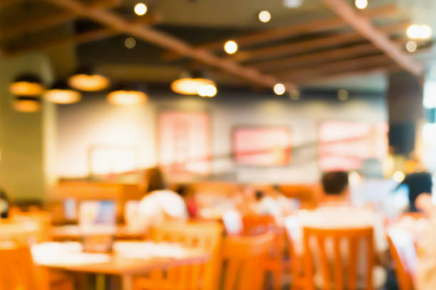 istock Abstract cafe coffee shoop restaurant blur background with bokeh light 910262384