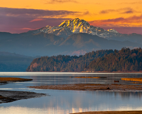The Brothers, at 6842' above sea level, are a pair of prominent peaks in the Olympic Mountains of Washington State. This picture was taken at sunset from Annas Bay near the town of Union on Hood Canal.