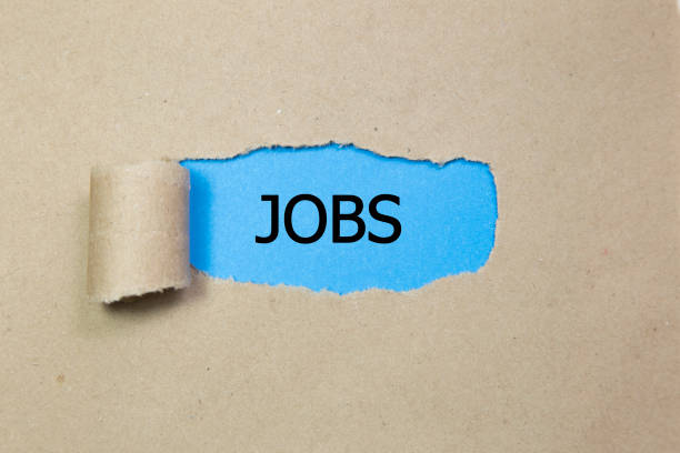 istock The text jobs appearing behind torn paper 910266106