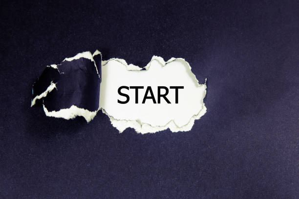 istock The word start written on torn paper 910266116