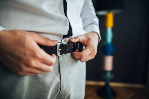 istock groom preparing for wedding ceremonies 910280466