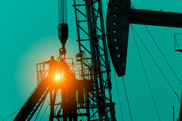 istock the oil workers are working 910280844