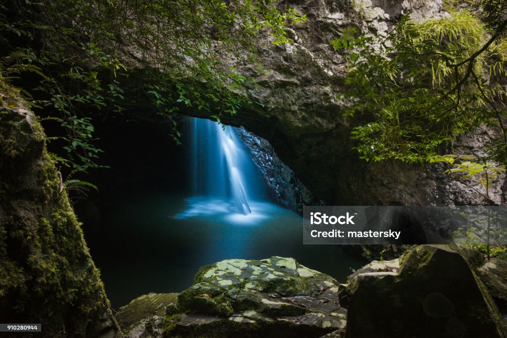 Natural Bridge in Springbrook National Park. Scenic Australian Tropical Landscape in Queensland with beautiful waterfalls in the cave Australia Stock Photo