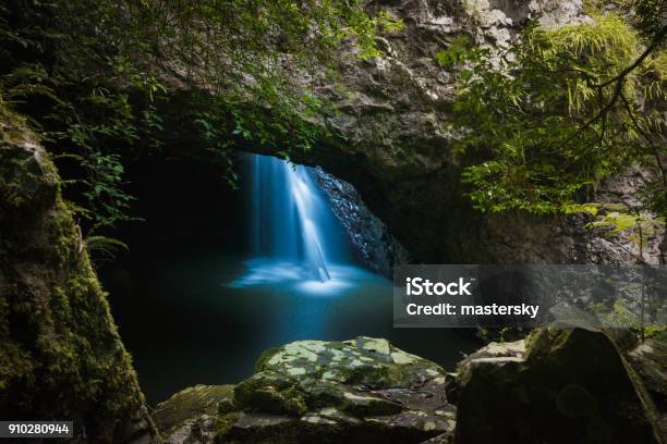 Natural Bridge In Springbrook National Park Scenic Australian Tropical Landscape In Queensland With Beautiful Waterfalls In The Cave Stock Photo - Download Image Now