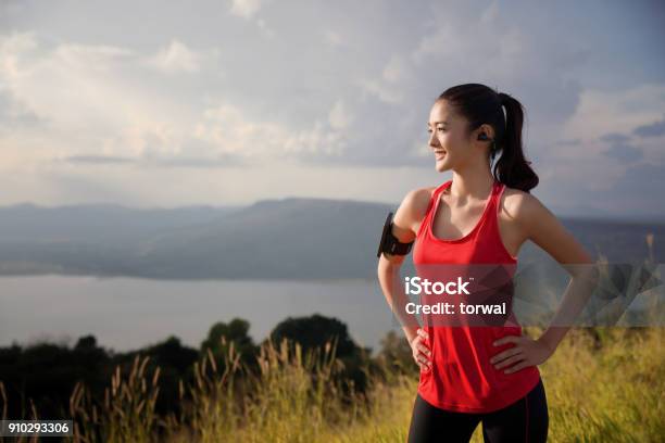 Asian Women Are Relaxing Out Of The Running Exercise She Is Looking Sun Stock Photo - Download Image Now