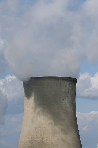 istock Coal-fired power station's cooling tower's emissions rising into the sky 91029959