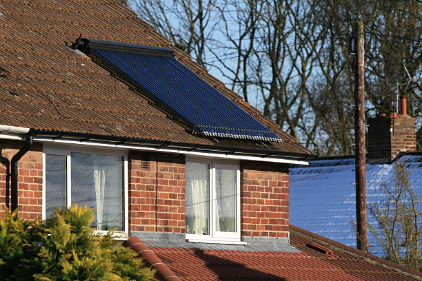 istock Glass tube solar water heating panel working in the winter 91030261