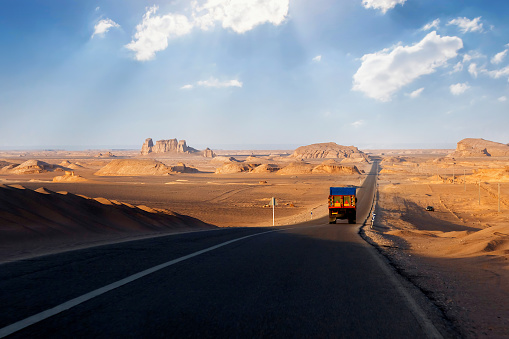 Road in the desert of Iran. Traveling to Iran by car.