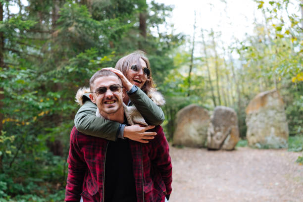 istock guy and girl have fun 910311378