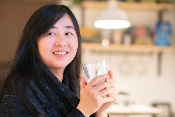 istock young girl drinking milk at night 910314936