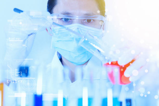 istock Laboratory glassware containing chemical liquid, science research. 910314948