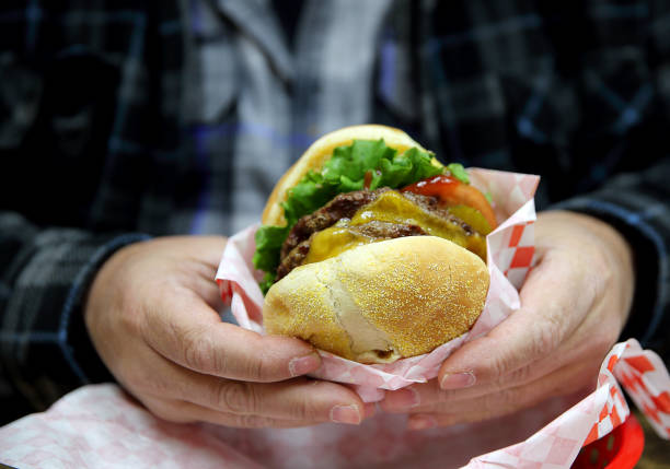 istock Double Hawaiian Cheeseburger on a Toasted Kaiser Roll with Pineapple 910319032