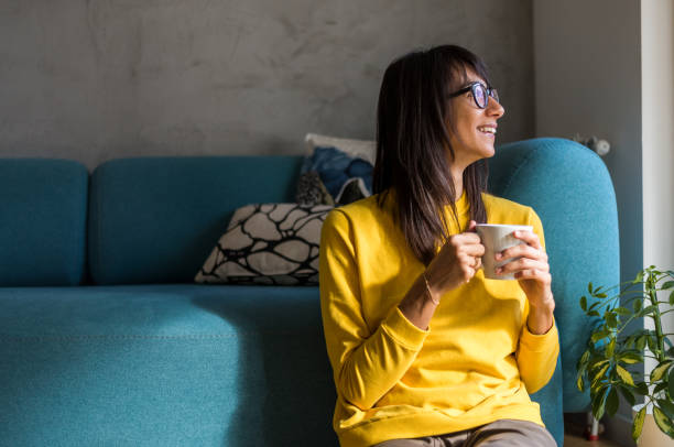 istock Woman having a break from work at home office 910325346