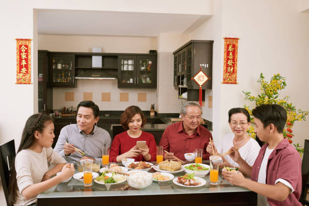 istock Family celebrating New Year at home 910325508
