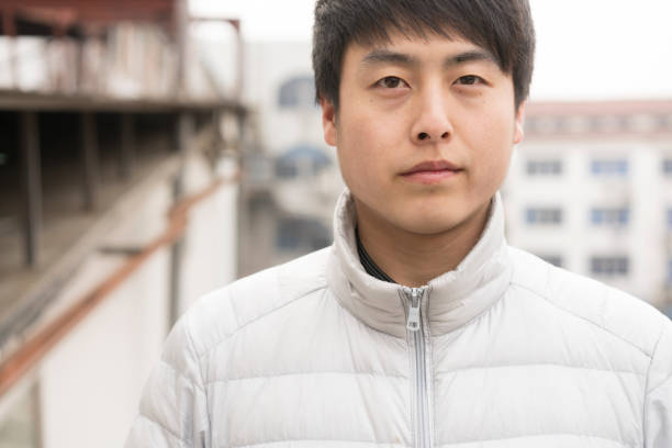 istock portrait of man looking at camera 910326184