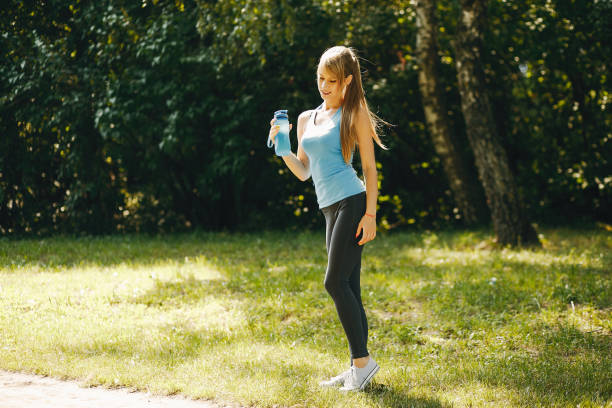 istock girl working out by herself 910326266
