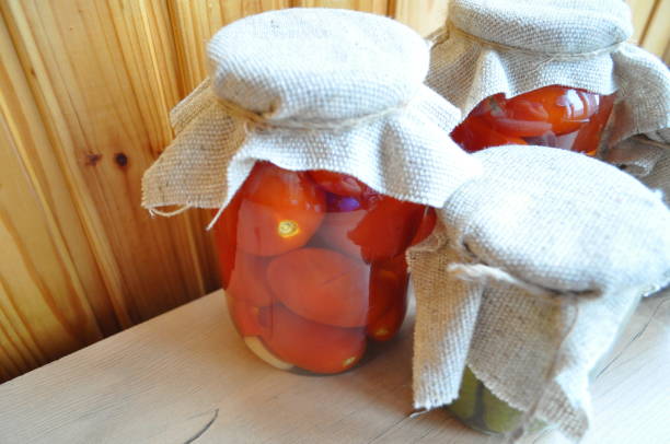 istock a group of cans with canned tomatoes and cucumbers 910335890