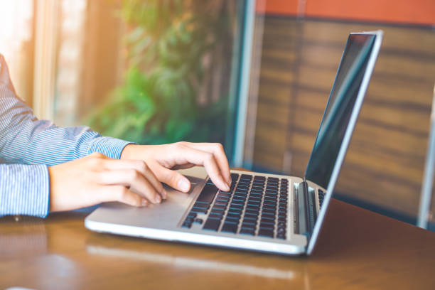 istock Woman hand working on laptop in the office. 910336912