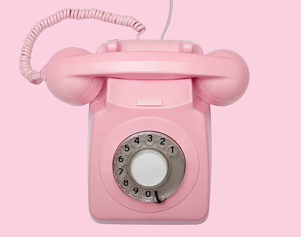 istock Old pink telephone on pink background with path 91033768