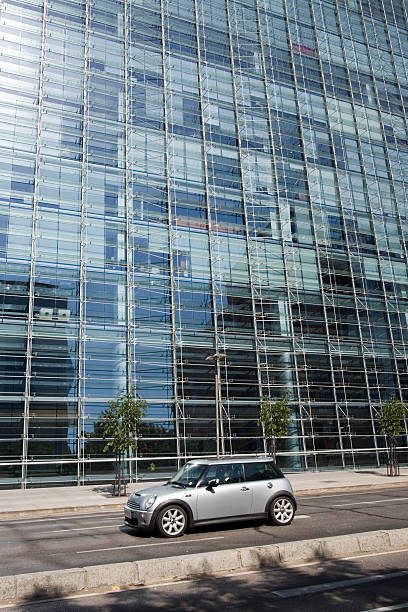 istock Mini in front of a big building 91034208