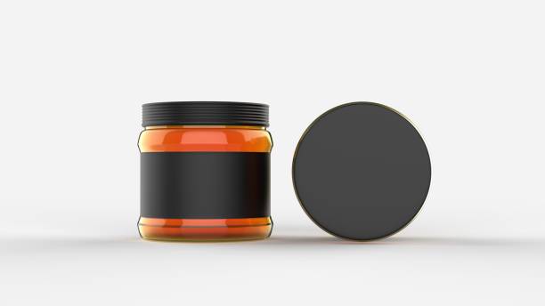 istock Honey in jar mock up isolated on soft gray background with black label. Small size. 3D illustrating. 910344944