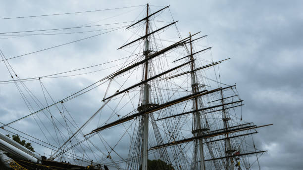 istock Sailing ship with tall masts against a gray sky 910345246