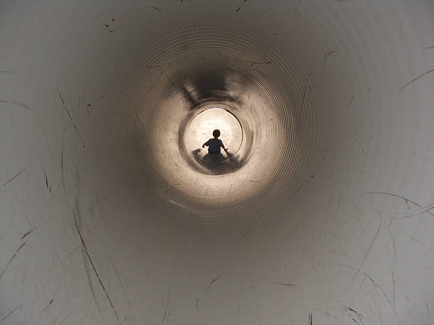 istock Another Long Descent: Summer at the Park Boy on Slide 91034670