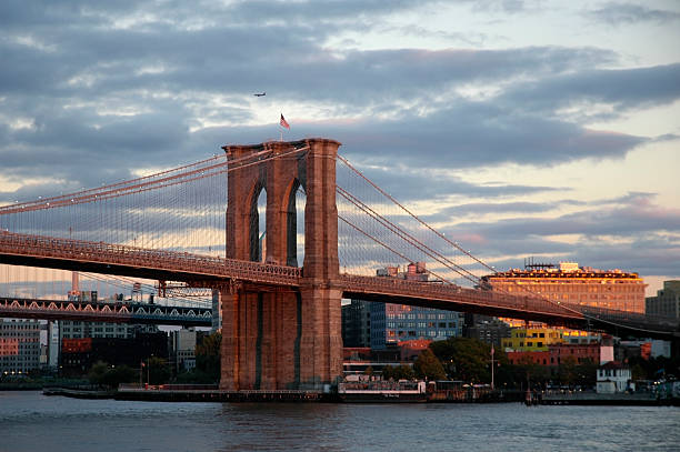 Dramatic sky over Brooklyn Bridge stock photo