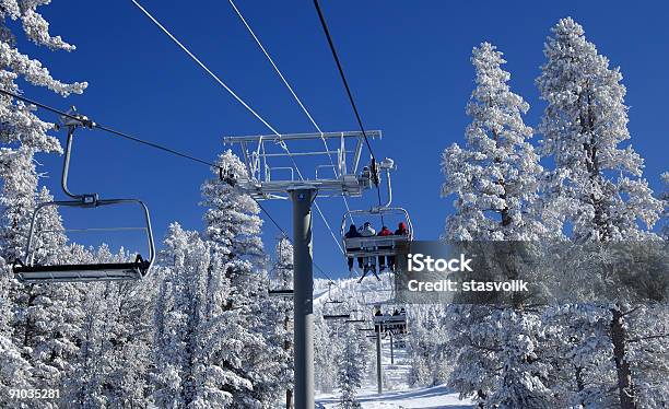 Riding A Lift At Ski Resort Stock Photo - Download Image Now - Lake Tahoe, Skiing, Ski Lift