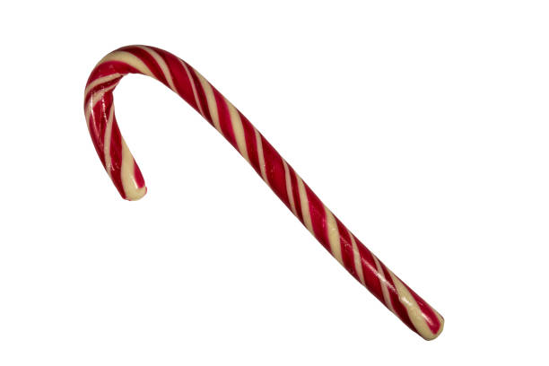 istock Holiday candy cane isolated on white background 910352998