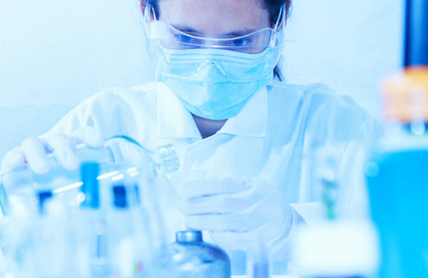 istock Scientist with equipment laboratory for science concept. 910353452