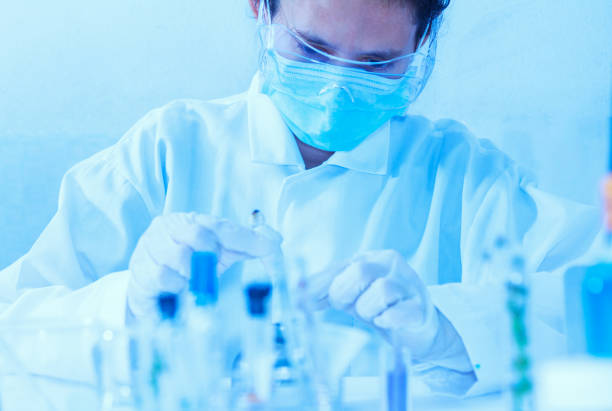 istock Scientist with equipment laboratory for science concept. 910353480