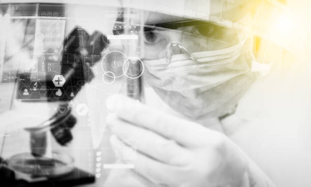 istock Double exposure of scientist with  microscope,equipment and science experiments ,laboratory glassware containing chemical liquid, science or other your content,copy space,mock up. 910354200
