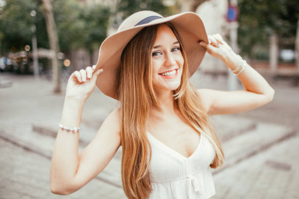 istock Positive Young Beautiful Woman Outdoors in Summer 910366518