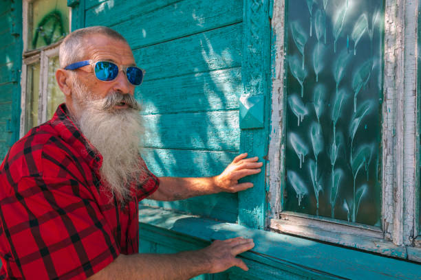 Portrait Senior Man with White Beard on a journey through the Russian rivers
